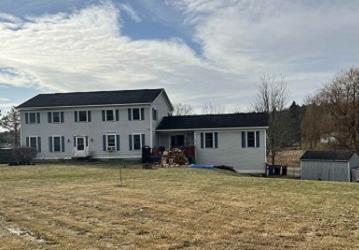 103 Court Street - two-story residence with addition and outbuildings on a large lot